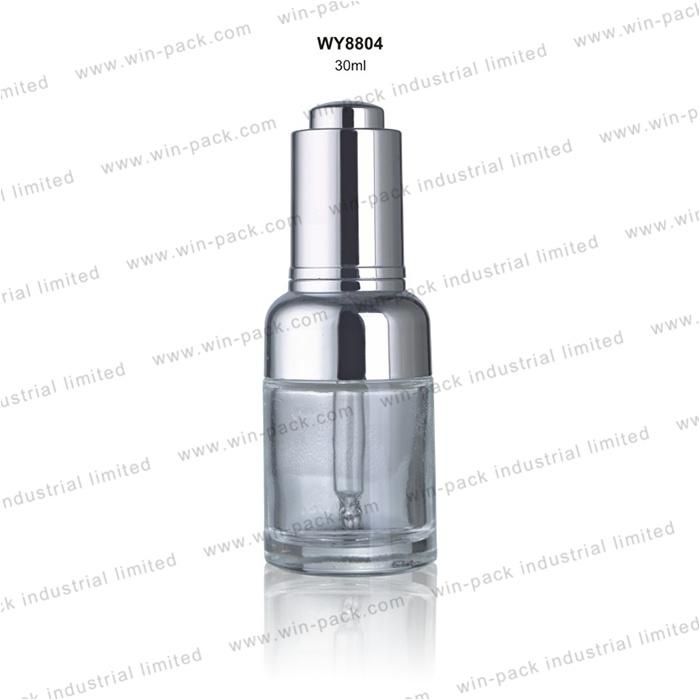 Winpack Factory Oil Empty Clear Glass Dropper Bottles for Cosmetics Packing 30ml Glass Dropper Bottles Cosmetic Glass Lotion Bottle with Press Cap