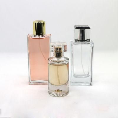 50ml 100ml Square Cosmetic Packaging Glass Perfume Bottle with Square Transpraent Spray Cap Custom Logo and Color