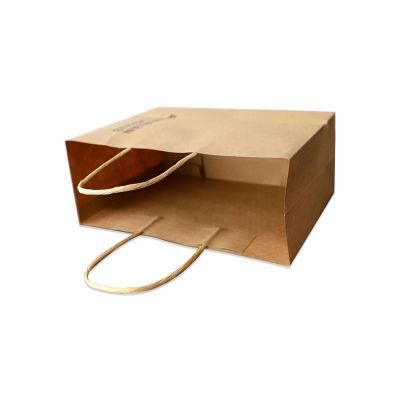 Kraft Paper Clothes Packaging Bags with Handle Design Printed Paper Strength Bags