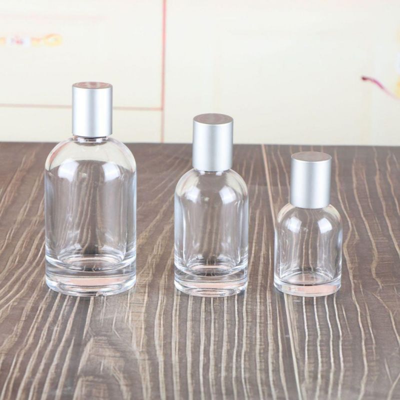 High Quality 30ml/50ml/100ml Perfume Spray Bottle Glass Cosmetic Container Empty Refillable Bottles with Silver Caps