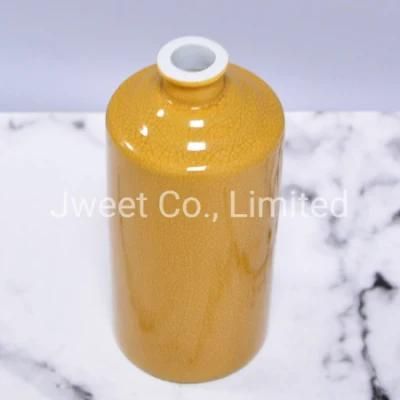 Hot Selling Round Shape Glazing Yellow Wine Ceramic Bottle