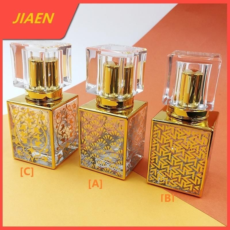 China Wholesale Empty Tranparent 30ml Flint Glassware Square Shape Refillable Perfume Bottle with Gold Stamping Finishing with Spray Atomizer 2022 New Arrive