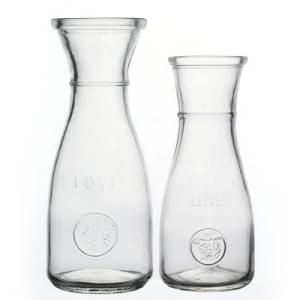 Glass Bottle Factory High Quality Round Wholesale Empty Flint Beverage Bottle