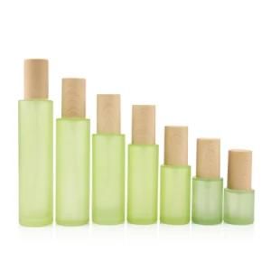 Lacquer Green Color Lotion Bottle with Bamboo Caps for Cosmetic Packing