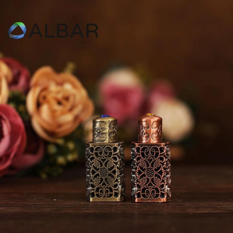 Hollow Zinc Attar Oud Metal Bottles Mini Glass Bottles with Curve Decorations