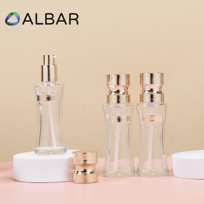 Light Gold Screw Pump Serum Glass Bottles in Round Shape for Body and Face Care