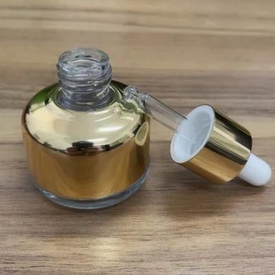 Good Quality 30ml Transparent Glass Dropper Bottle with Gold Aluminum Shoulder Cover