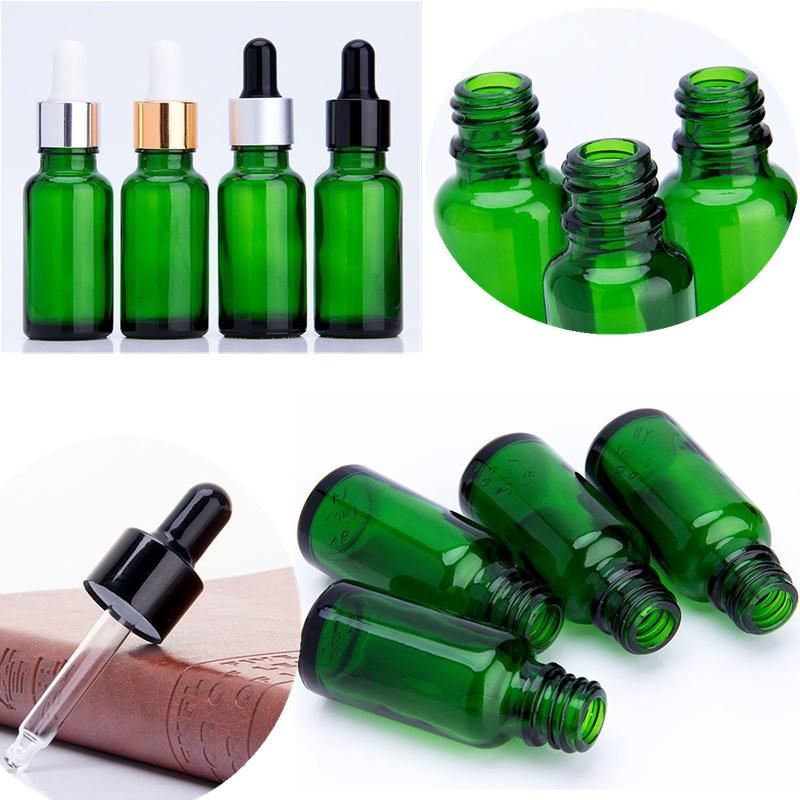 Green Glass Cosmetic Packaging Essential Oil Bottle with Glass Dropper or Plug for Cosmetic Oil