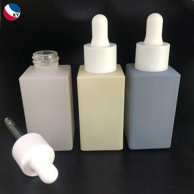 Custom Matte Finish Beautiful 1oz Square Bottle Colorful Frosted Grey Blue Yellow Flat Shoulder Glass Serum Dropper Bottles 30ml