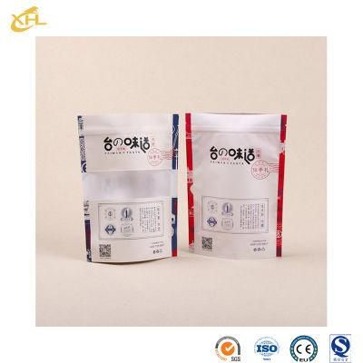 Xiaohuli Package China Standing Packing Pouch Manufacturers Embossing Stand up Pouch for Snack Packaging