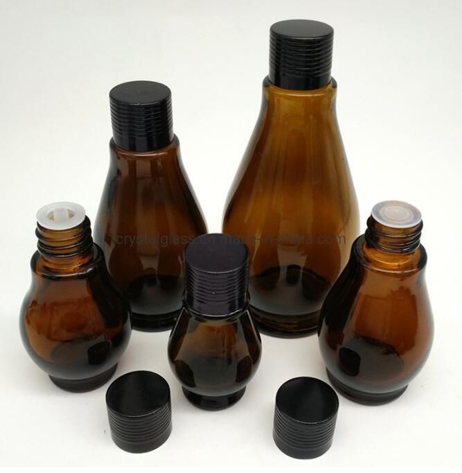 10ml 20ml 30ml 50ml 100ml Round Shape Amber Glass Massage or Essential Oil Bottle with Press Dropper