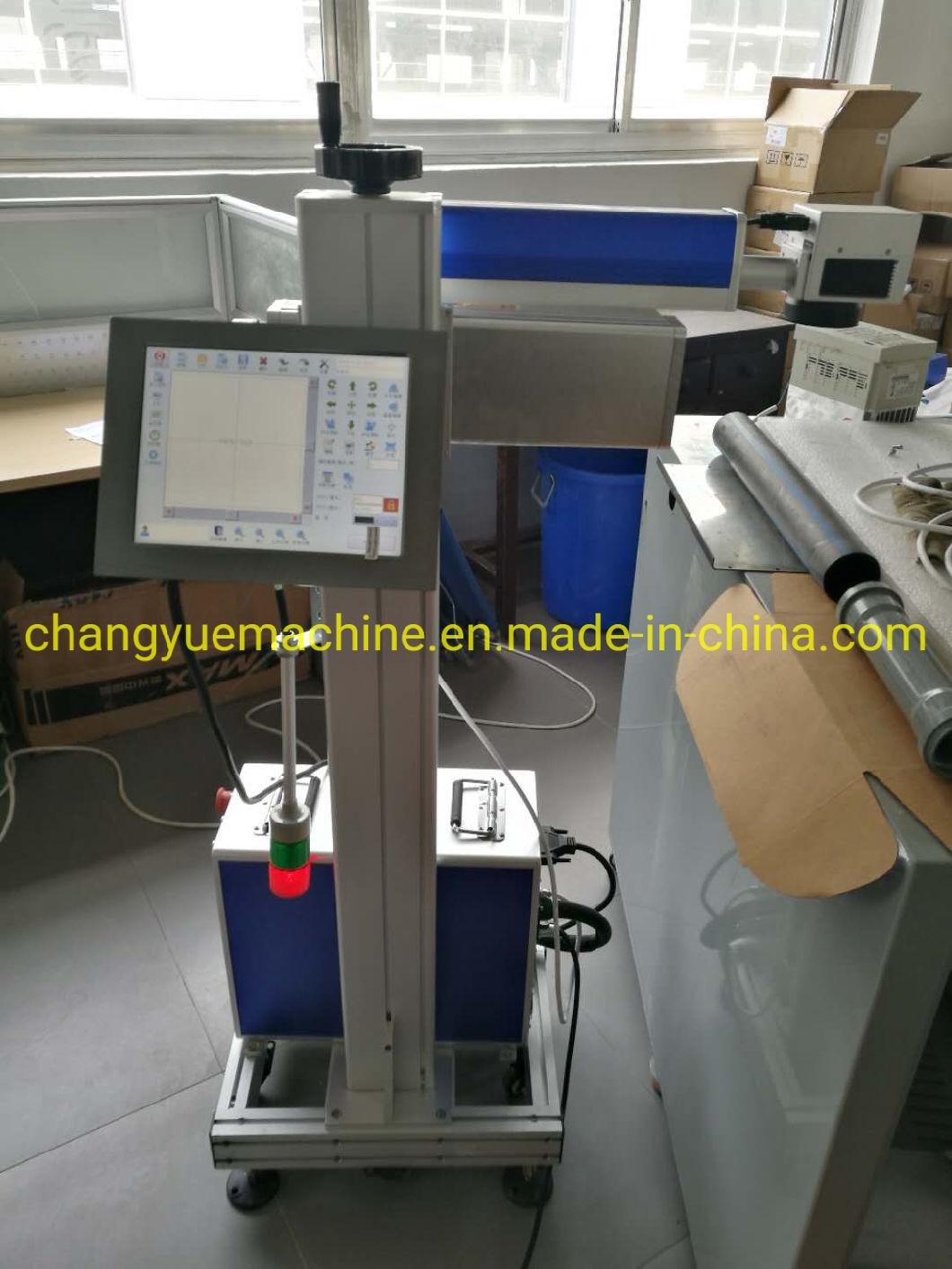 China Fly Fiber Laser Printer for PVC HDPE Mpp Pipe / Laser Coder / Coding Machine