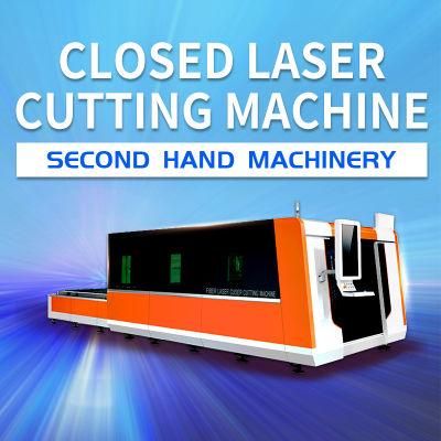 Old 6000W High Speed Exchange Worktable Closed CNC Fiber Laser Machine with Exchange Worktable