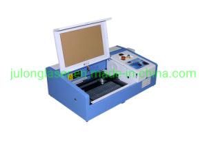 China New Laser Engraving and Cutting Machine with a Precision 40W Water Cooled CO2 Laser with Low Price