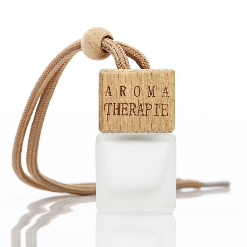 Wholesale 10ml Air Freshener Diffuser Empty Frosted Car Hanging Perfume Bottle with Wooden Cap