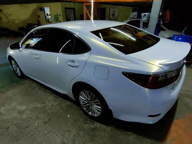 Pearlescent Symphony Bright White to Gold Full Body Car Film