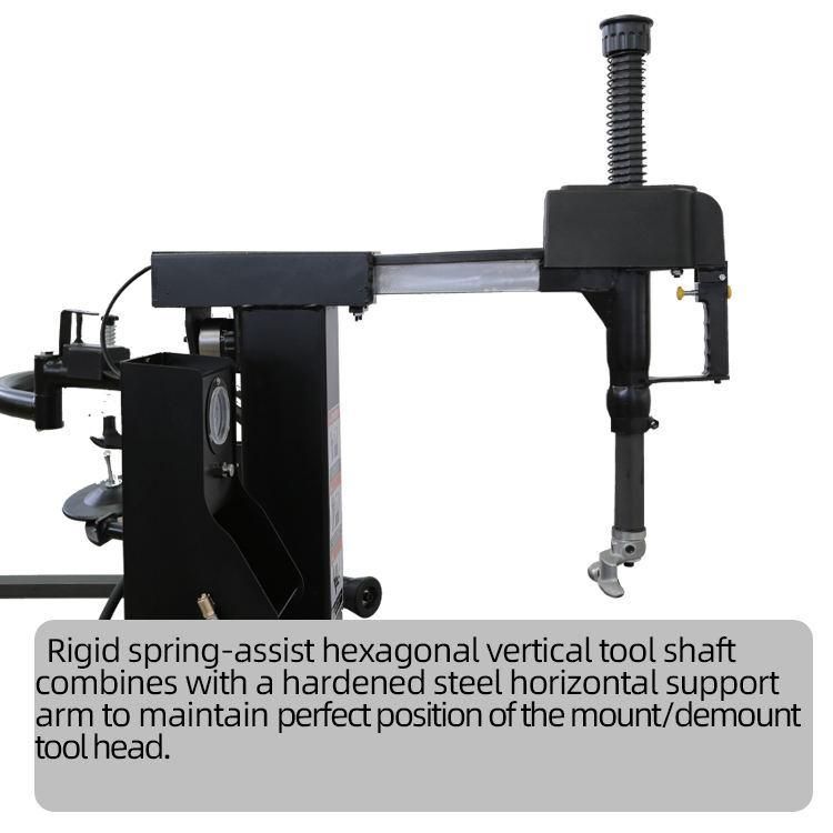 Tire Changer with Auxiliary Arm