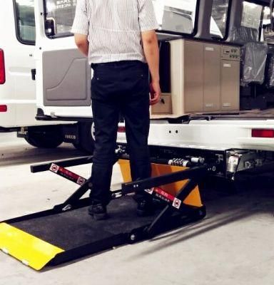 Semi-Automatic Wheelchair Lift for Vans Installed in Back Door