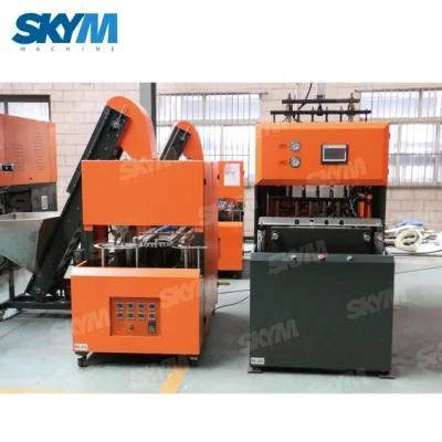 Semi Automatic 4 Cavity Bottle Blow Moulder Machine