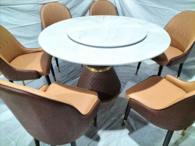 Round Table with Rotating Center Marble Dining Table with Leather Chairs