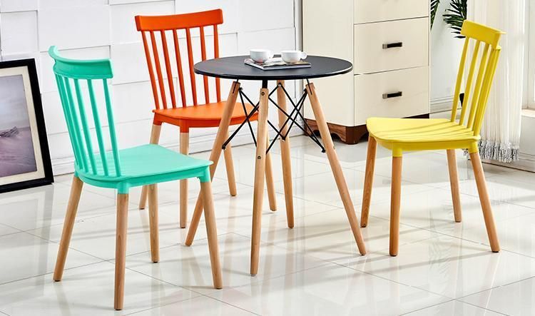 Wholesale Cheap New Design Modern Wooden Legs Plastic Dining Chairs with Beech Wood Legs PP Plastic Chairs for Sale