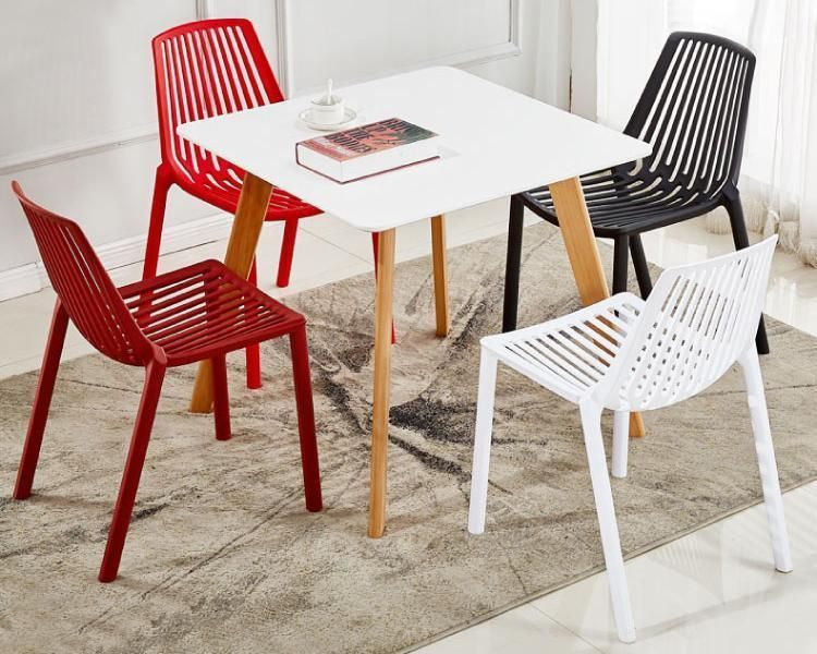 China Factory Home Furniture Modern Design Stackable Plastic Colored Chair Dining Room PP Seat Plastic Dining Chairs