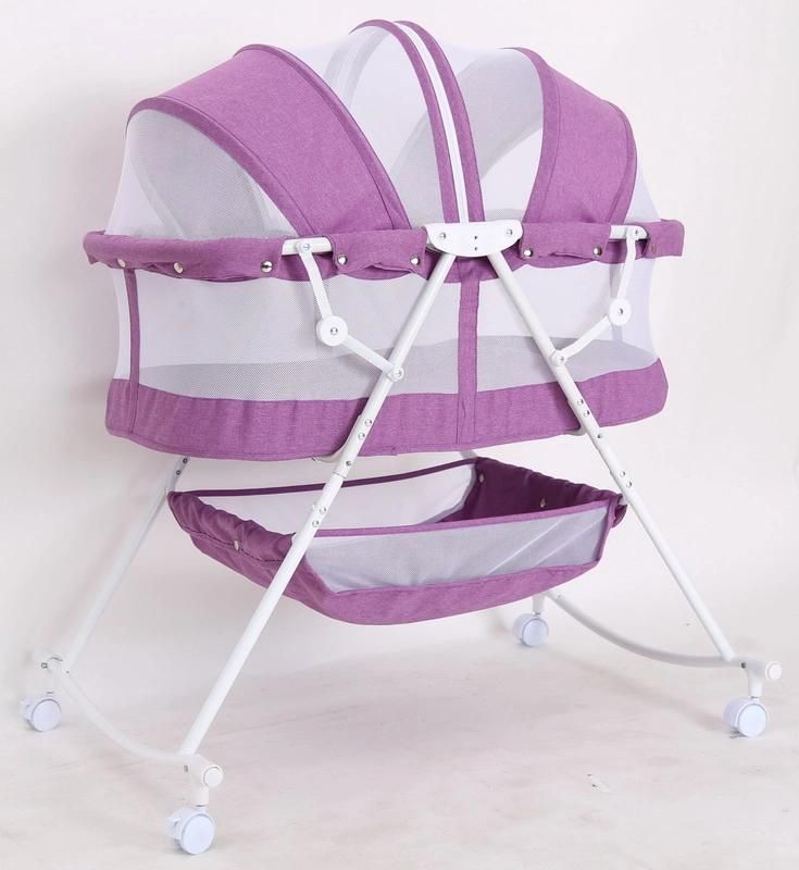 Compact Baby Bed with Canopy and Rocking Function