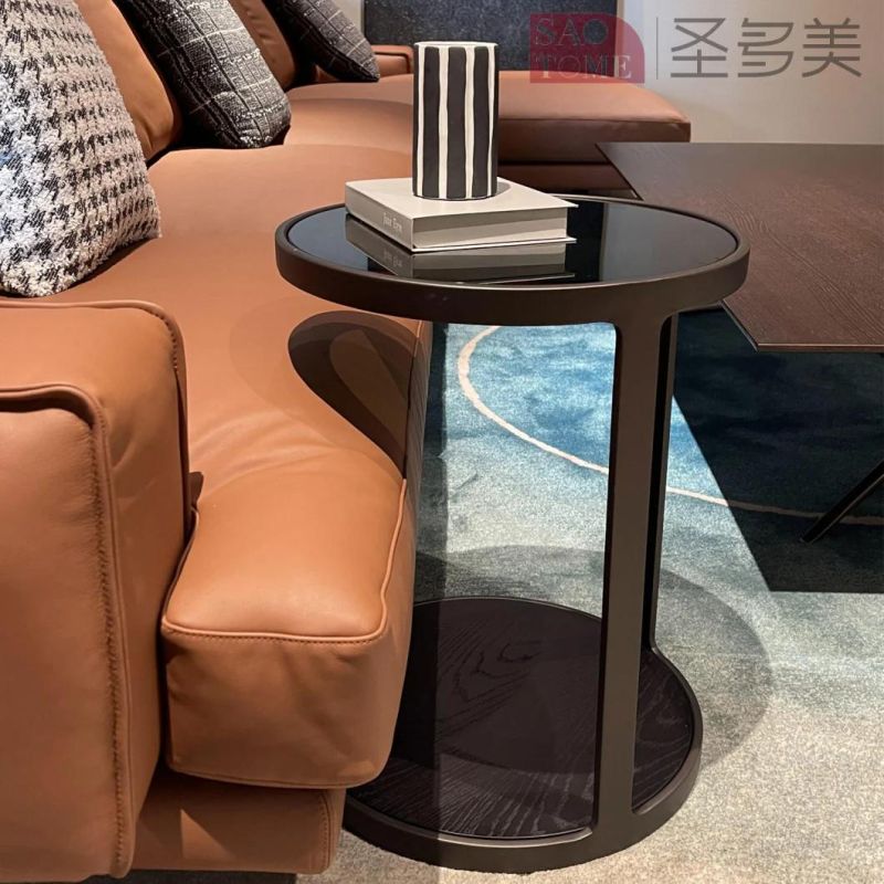 Small Round Table with Gray Glass Surface on Wooden Coffee Table