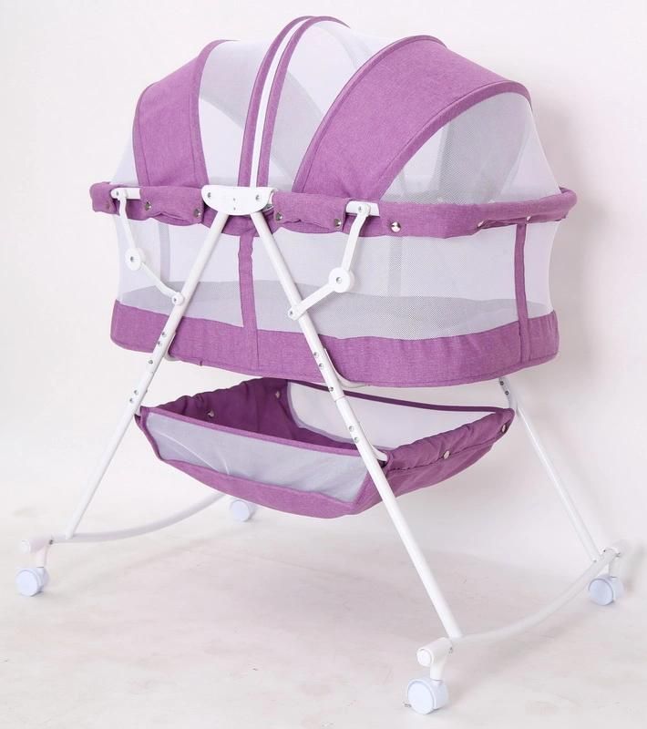 Compact Baby Bed with Canopy and Rocking Function