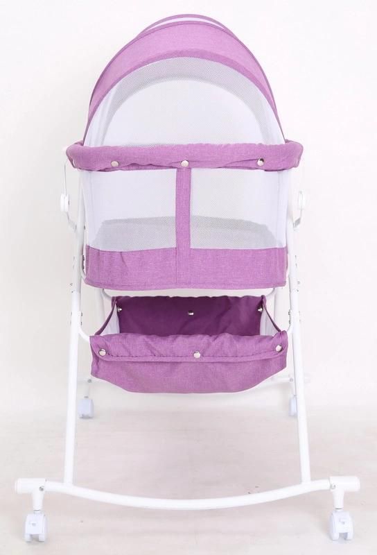 Compact Baby Bed with Canopy and Rocking Function